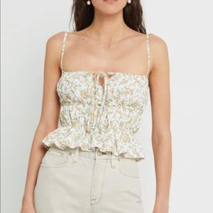 Kourt floral top. New with tags. Size small